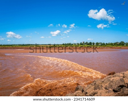 Tidal Bore at Fundy Discovery Site in Truro with oceanside tides traveling upstream on the Salmon River in Nova Scotia, Canada