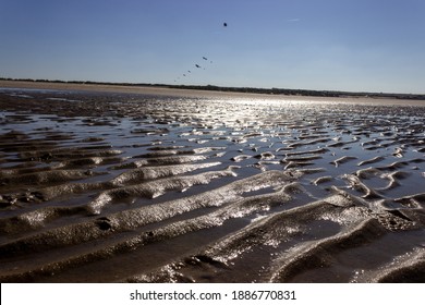 Tidal Flats With Multiple Kites In The Background Zeeland The Netherlands Europe