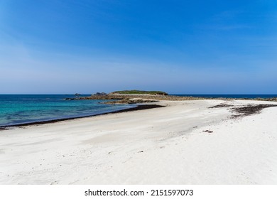 A Tidal Island At The End Of A Sandbank On The Finistère Coast