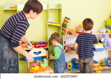 Tidy up own toys - Shutterstock ID 1022973907