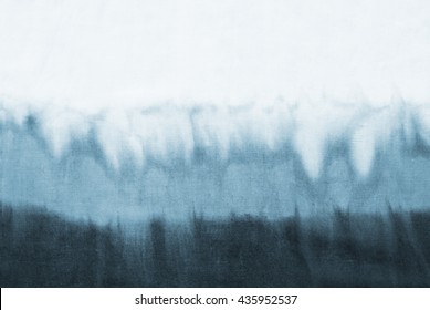 tie dye pattern dip dyed technique on cotton fabric background.

 - Shutterstock ID 435952537
