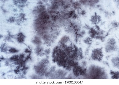 tie dye pattern hand dyed on cotton fabric abstract texture background.