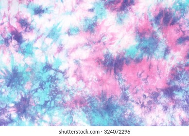 tie dye pattern hand dyed on cotton fabric background.

 - Shutterstock ID 324072296