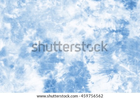 tie dyed pattern on cotton fabric for background.
