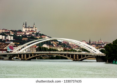 A Tied Arch Bridge Crossing The Rhone River In Lyon, France