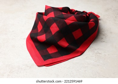 Tied Red Checkered Bandana On White Table