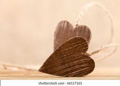 tied wooden hearts, free standing, shallow dof