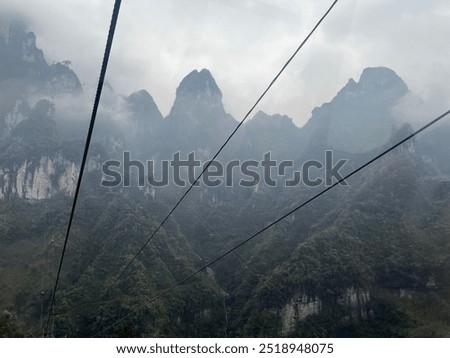 Similar – Foto Bild Morgensonne und Nebel in den Dolomiten