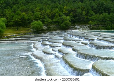 Tiered Waterfall In The Mountain