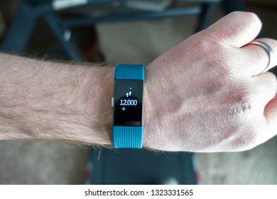  Tiffin, Iowa, USA - 2/2019:  Fitbit Charge 2 screen.  Fitbit is an American exercise-tracker manufacturer company                              