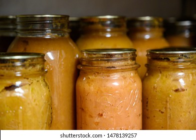 Tiffin, Iowa, USA - 7/2019: Canned Apple Sauce Preserved In Ball Glass Mason Jars