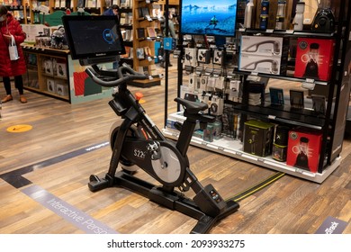 Tigard, OR, USA - Dec 20, 2021: A NordicTrack Commercial S22i Studio Cycle Integrated With IFit, An Interactive Streaming Services For Virtual Fitness Coaching, Is Seen On Display In An Amazon Store.