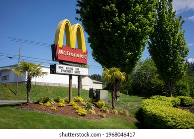 Tigard, OR, USA - May 4, 2021: The Golden Arches Logo With Overnight Shift Jobs Ad Is Seen Outside A McDonald's Restaurant In Tigard, A Suburb Within Portland Metro Area, During A Pandemic Springtime.