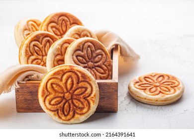 Tigelle Or Crescentine, Crescente. Thin Round Breads From The Emilia-Romagna, Northern Italy Food. Made From Flour, Water, Salt, And Yeast. Selective Focus. White Table Surface.