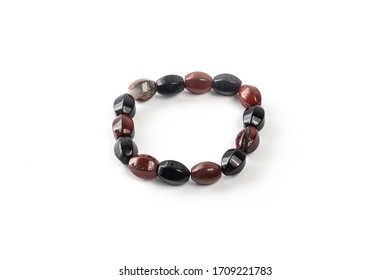 Tiger Eye Bracelet On A White Background Isolate