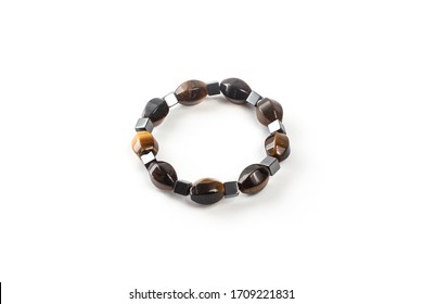 Tiger Eye Bracelet On A White Background Isolate