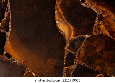 Tiger Eye Golden. Semiprecious texture as background. Mineral quartz beautiful golden-brown color with silky sheen. Material texture for unique interior, exterior design. Matt semi precious pattern. - Shutterstock ID 2211759053
