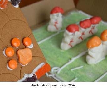 Tiger Paw On Gingerbread House With Marshmallow Football Players