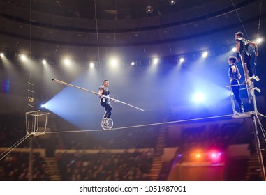 Tightrope walkers at the circus.