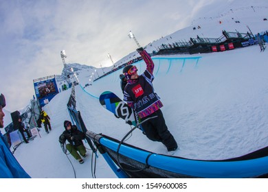 Tignes, France - March 10 2010 : An Athlete Is Celebrating His Victory In The Half Pipe Stadium Of The Winter X Games