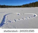 Tiilikka, Rautavaara, Finland, March 4 2022. A spring skiing and outdoor day in Tiilikka National Park. Snowshoes had done the heart.
