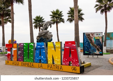 TIJUANA, BAJA CALIFORNIA, MEXICO - OCTOBER 22, 2018:  A giant colorful sign welcomes visitors to Playas de Tijuana near the International Border wall between Tijuana and San Diego, California. 