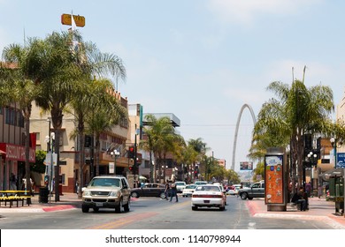 TIJUANA, BAJA CALIFORNIA/MEXICO - JUNE 20, 2018:  Traffic Along Avenida Revolucion, The Main Thoroughfare Of The City, With A View Of The Landmark Monumental/Millennial Arch (Arco Y Reloj Monumental).