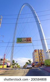 TIJUANA, MEXICO - FEBRUARY 26 2014: The Millennial Arch (Arco Y Reloj Monumental) At The Entrance Of Avenida De Revolucion, At Zona Centro And A Landmark That Welcomes Tourists, Bienvenidos A Tijuana.