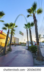 TIJUANA, MEXICO - FEBRUARY 26 2014: The Millennial Arch (Arco Y Reloj Monumental) At The Entrance Of Avenida De Revolucion, At Zona Centro And A Landmark That Welcomes Tourists, Bienvenidos A Tijuana.