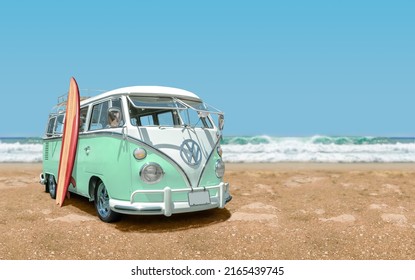 Tijuana - Mexico – July 16, 2019: Calssic 1966 Volkswagen Bus with surfboard front view at the beach with sea and blue sky in the background.