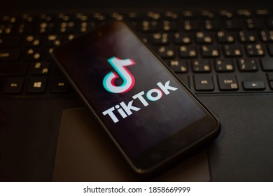 Tik Tok Logo On Smartphone Screen Placed On Laptop Keyboard. Kyiv 2020