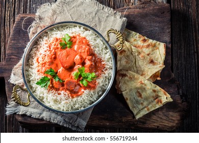 Tikka masala with rice, chicken and Naan bread