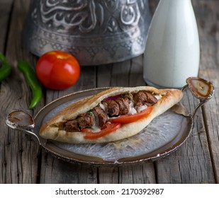 tikka sandwich served in a dish side view on wooden table background