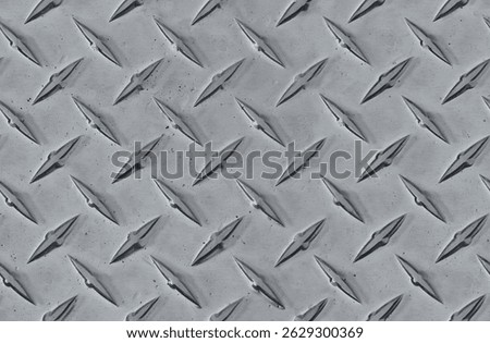 Tilable and loopable seamless metallic diamond plate texture, ideal for 3D modeling, design backgrounds, and industrial concepts.
