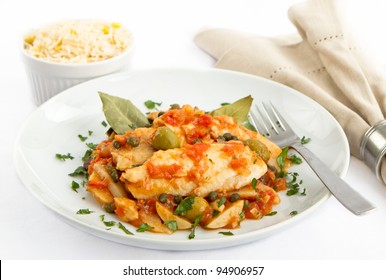 Tilapia Fish Prepared Veracruz Style With Tomatoes, Potatoes, Capers And Olives