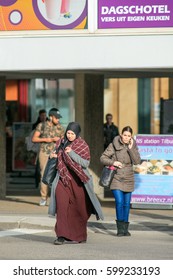 TILBURG-MARCH 10, 2017. Islamic women dressed in a chador. Body coverings are common in Islamic countries. Women who live outside these countries are not usually required to wear, but many still do.