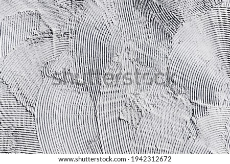 Tile adhesive texture. Facade plaster background. Gray plaster stripes pattern. Home renovation texture. White lines backdrop. Stucco wall background.