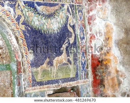 Tile mosaic on the wall of a building in Herculaneum, Italy, which was buried in ash in the eruption of Mount Vesuvius in 79AD
