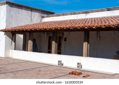 Tile Roofing On A Pueblo Style Building