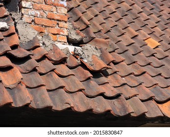 The Tiled Roof Collapses After A Strong Wind.