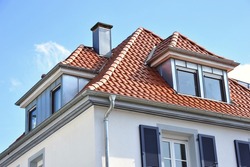 Tiled Roof With New Or Renovated Dormer Window