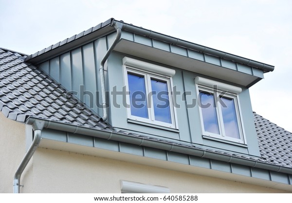 Tiled Roof with\
new or renovated Dormer\
Window