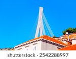 Tiled roofs and Dr. Franjo Tudman Bridge in Dubrovnik Croatia


