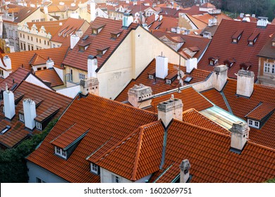 tiled roofs of houses in Prague. the view from the top