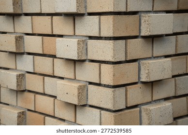 A tiled wall with protrusions