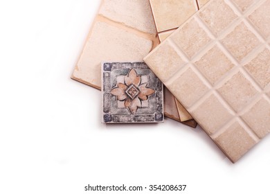 Tiles Of Small, Medium, Large And Decorative On A White Background