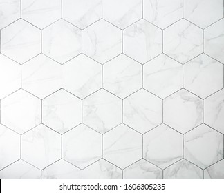 Tiles. A White Marble Wall With Hexagon Tiles For Texture And Background.