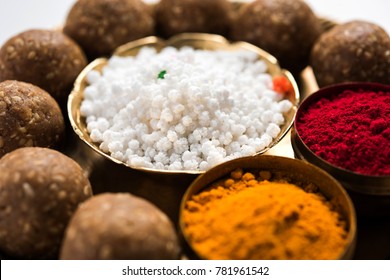 Tilgul or Til Gul with haldi Kumkum and halwa/chiranji or sugar balls for makar sankranti festival