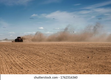 Tillage In A Strong Wind. Soil Erosion. Ecological Problems.