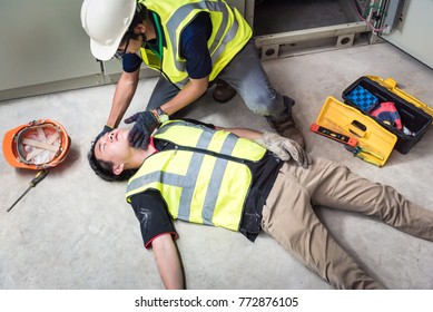 Tilt Head, Life-saving and rescue methods. Accident at work of electrician job or Maintenance worker in the control room of factory. - Shutterstock ID 772876105